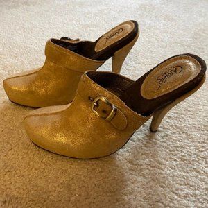Carlos by Carlos Santana gold leather mules.
